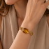 Eternos Acessórios - Pulseira Feminina Aço Inox 316L Dourada Citrino Regulável Eternos Acessórios - Pulseira Feminina Aço Inox 316L Dourada Citrino Regulável