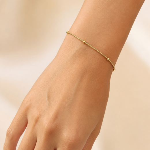 Pulseira Feminina Bolinha Fina Dourada em Aço Inox 316L