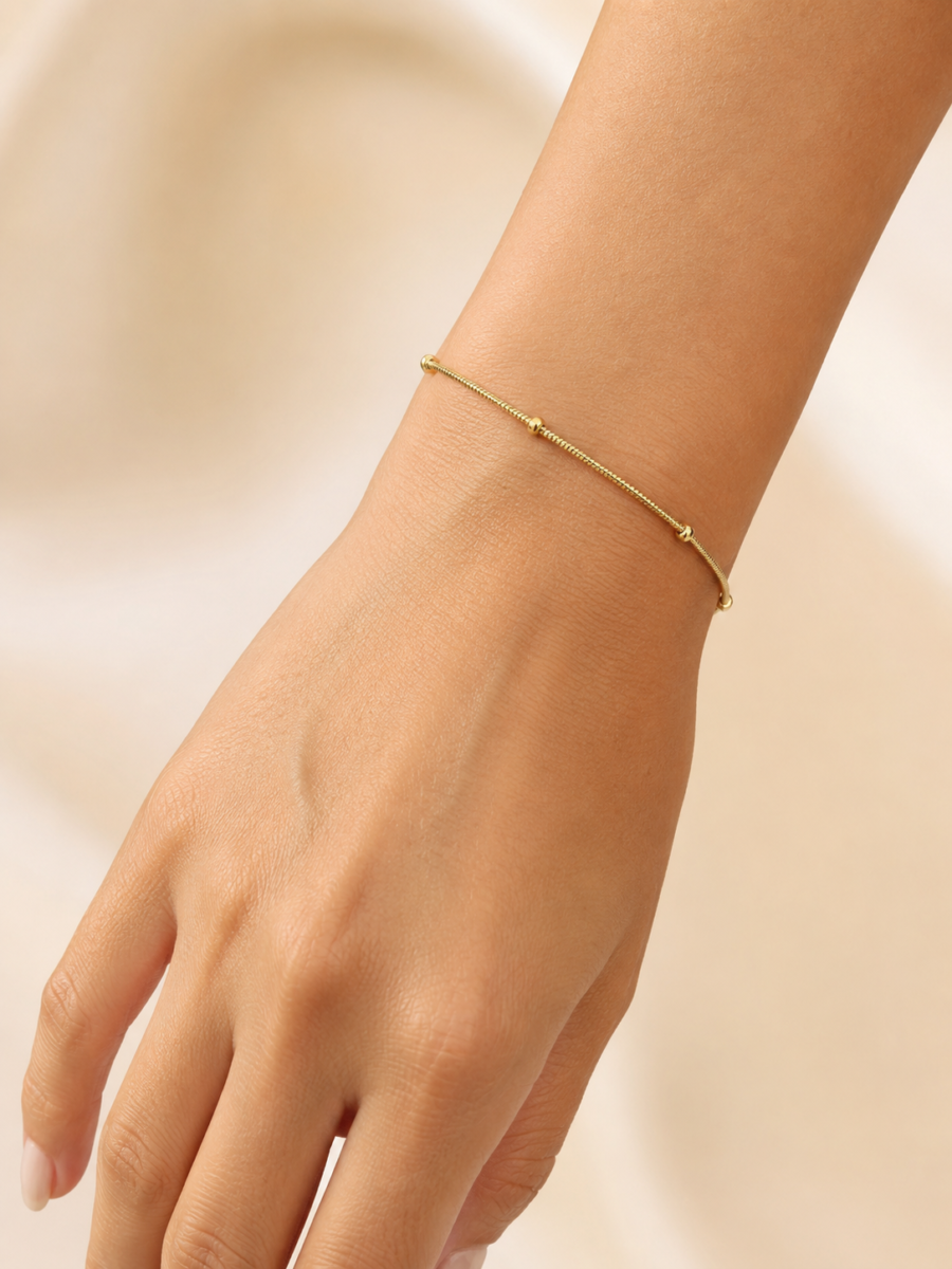 Eternos Acessórios - Pulseira Feminina Bolinha Fina Dourada em Aço Inox 316L